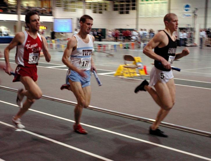 Matt Fortin runs alongside New England competion from Keene State and Bowdoin.