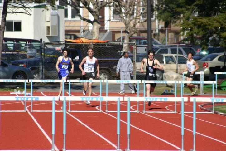 Dave Sorenson, Dave McCleary and Chay Uy compete in the 400 hurdles.