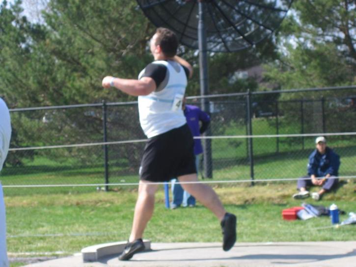 Ryan Bryne shows good form in the Shot Put