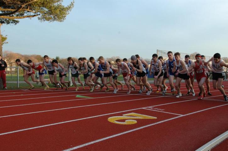 28 men take off from the start line in the 5000.  Running for Tufts are Nate Brigham, Matt Lacey, Matt Fortin, Mike Don, Neil Orfield, Justin Chung and Brendan McNeish.