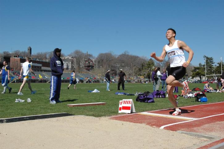 Kenny Kang takes off in the Long  Jump