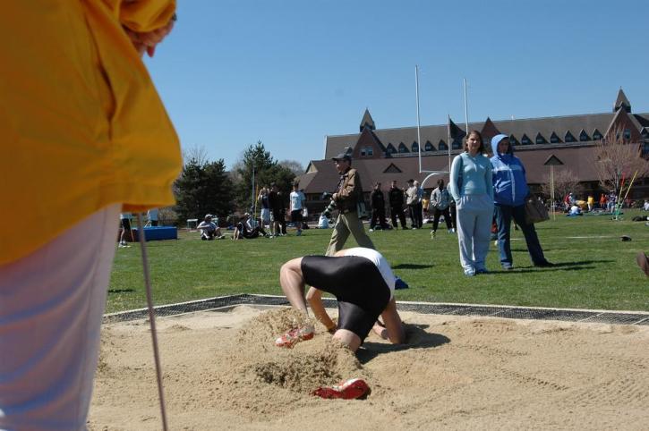 Kenneth Kang exits the long jump pit