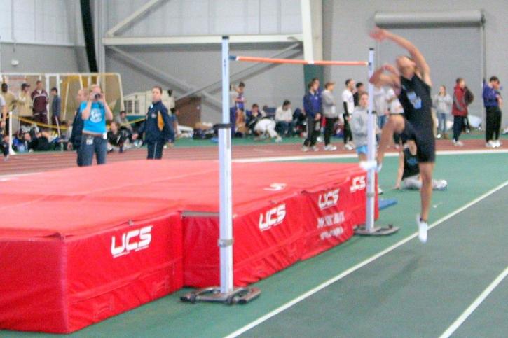 Nate Scott takes off in the High Jump