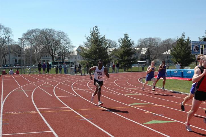 Rony Jacques comes around the first curve in the 400