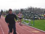 Mike Don runs in the 10K at NESCAC's while Dave McCleary warms up