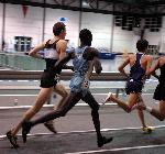 Nate Brigham and eventual winner Macharia Yuot of Widener run together in the 5000.