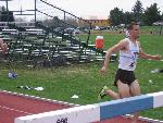 Matt Fortin prepares to tackle a  barrier in the Steeplechase