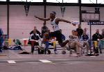 Fred Jones shows off his form in the triple jump prelims.