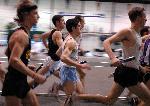 Aaron Kaye runs in the dense pack in the first leg of the DMR.