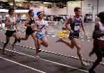 Pat Mahoney carries the baton for  Tufts in the 800 leg of the DMR.