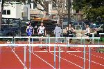 Dave Sorenson, Dave McCleary and Chay Uy compete in the 400 hurdles.