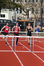 Trevor Williams chases a coulpe GBTC runners in the 400 hurdles.