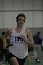 Brian McNamara carries the baton to victory for the Jumbos in the DMR