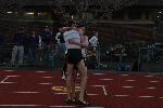 Nate Brigham and Matt Lacey celebrate after shattering the school record in the outdoor 5k.