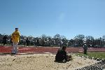 Fred Jones makes a landing in the long jump