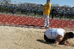 Kenneth Kang lands an attempt in the long jump