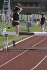Katy O'Brien uses her unconventional hurdle form in the steeplechase.