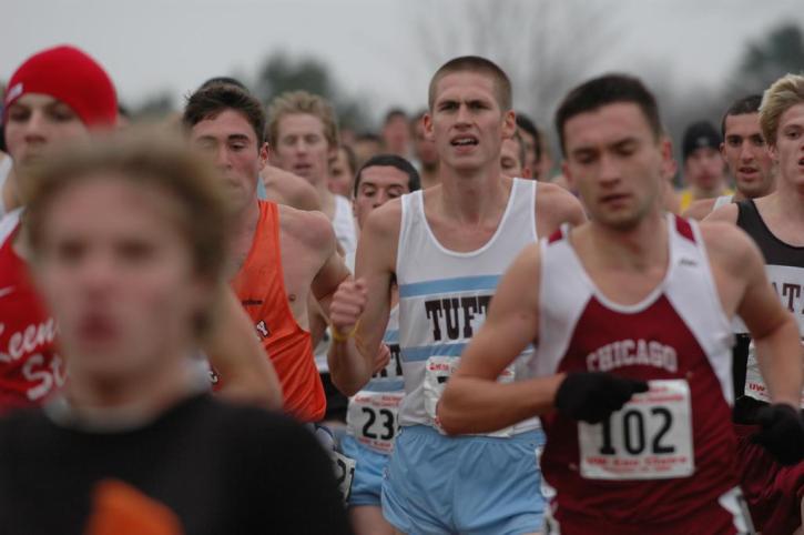 Nate Brigham in a sea of people with Matt Lacey and Josh Kennedy in toe