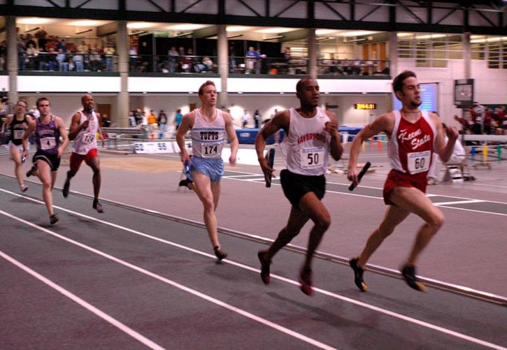 Trevor Williams moves up in the 400 leg of the DMR.