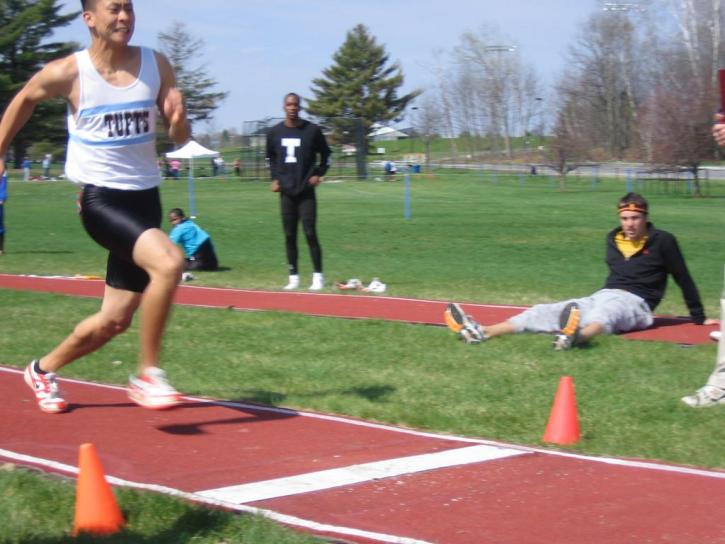 Kenneth Kang prepares for flight in the long jump