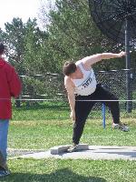 Jason Galvin follows through on a throw in the Shot Put