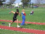 Nate Scott heads down the runway in the Long Jump