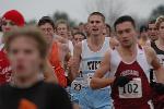 Nate Brigham in a sea of people with Matt Lacey and Josh Kennedy in toe