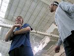 Jeremy Arak and Dan Marcy joke around before the High Jump