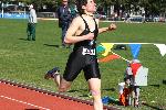 Dave McCleary finishes the 400 hurdles.