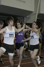Aaron Kaye hands off to Dustin Virgilio