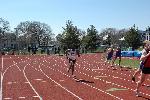 Rony Jacques comes around the first curve in the 400