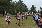 Matt Fortin in the final 300m with a huge pack behind him